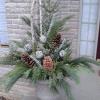 Rustic container garden with silver accents
